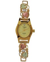 Black Hills Gold Analog Champagne Dial Ladies Gold Emerald