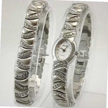 NICOLET Silver-Tone Austrian Crystals and Bracelet Two Piece Set. Model: NC-4002W