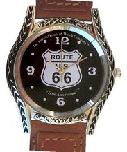 Western Style Route 66 Collectible By the Official Route 66 Company Has a Round Polished Chrome Case with Artistic Decorative Black Enamel Embossing and Brown Western Style Leather Strap
