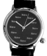 uThe NOW Watch "Now" Is the Time That Is Shown Each Hour on the Black Dial of the Polished Chrome Tone Round Shape with a Black Leather Strap 